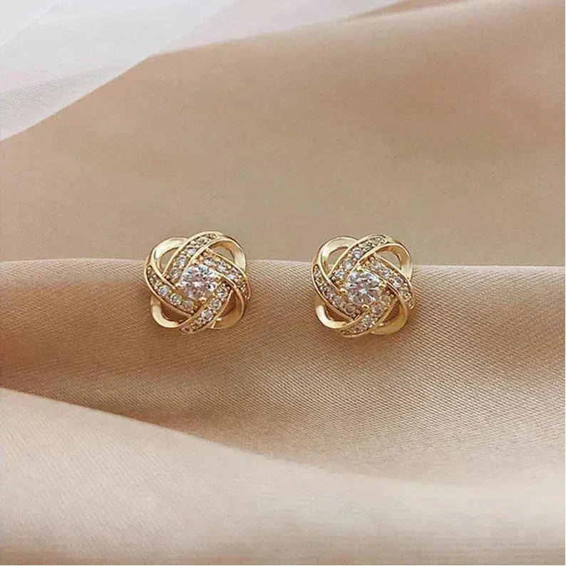 ÉCLAT | Pendientes Dorados Espiral Floral con Cristales