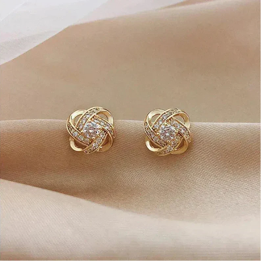 ÉCLAT | Pendientes Dorados Espiral Floral con Cristales