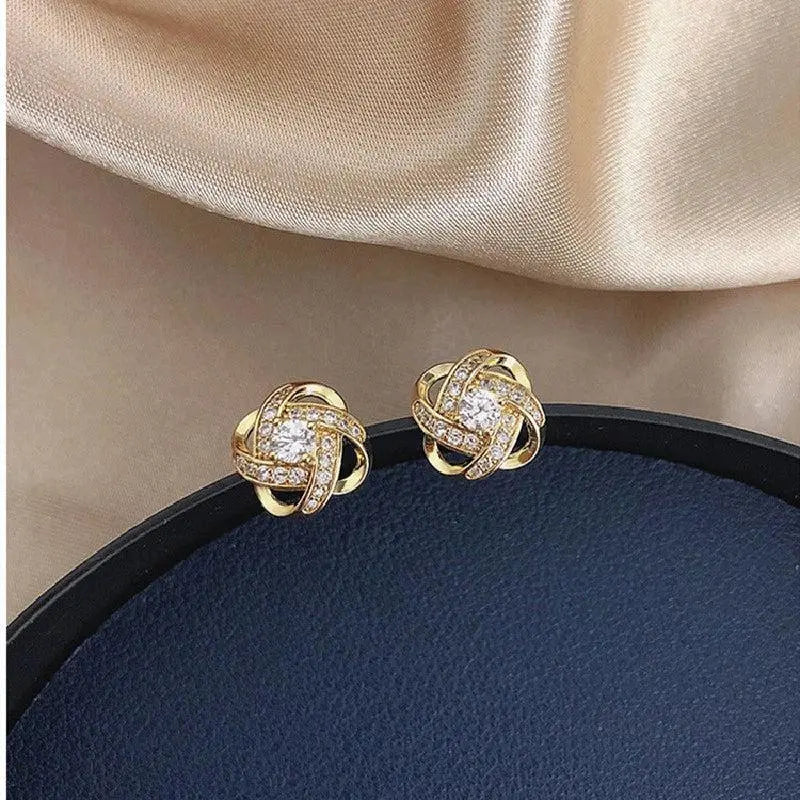 ÉCLAT | Pendientes Dorados Espiral Floral con Cristales