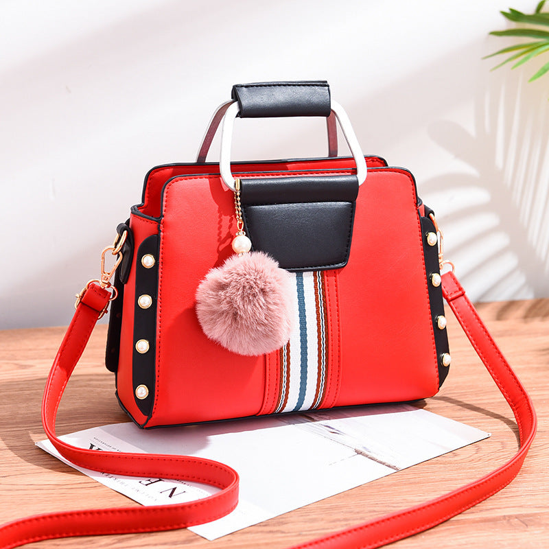 Bolso de mano con detalles modernos – Fiorella