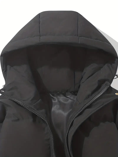 Capucha y forro de la chaqueta Stilla en negro, vistos de cerca
