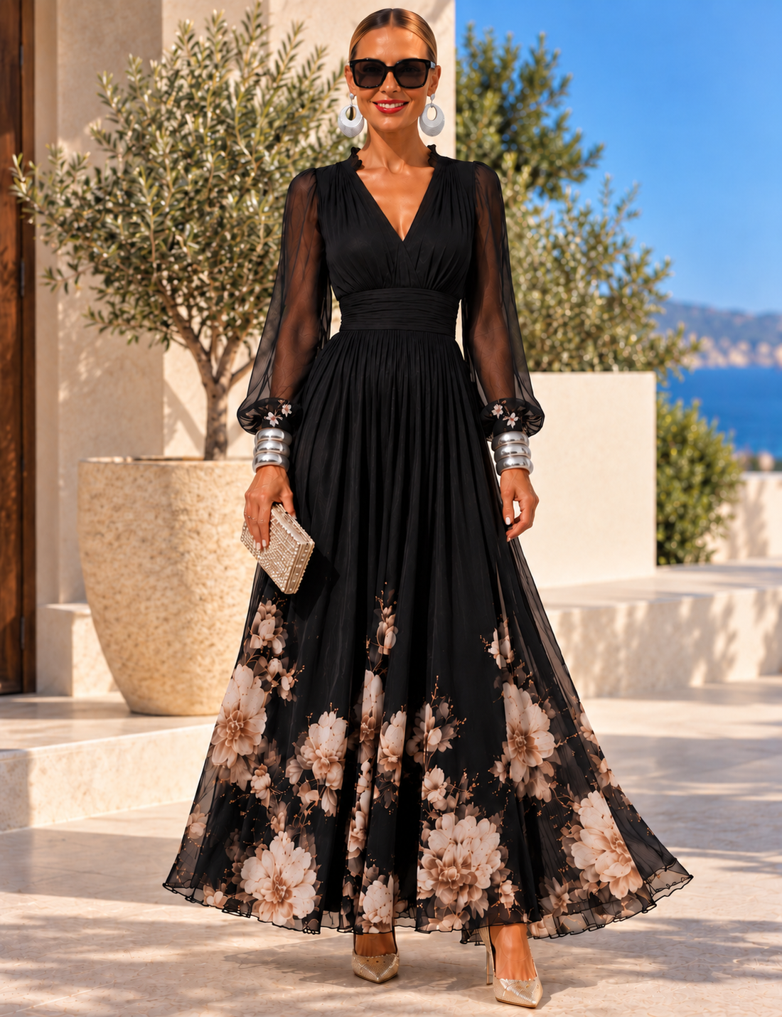 Vestido de gasa floral negro, de frente, con mangas de gasa y falda con flores