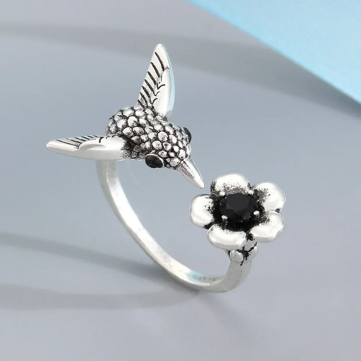 ÉCLAT | Anillo Colibrí y Flor (Ajustable)