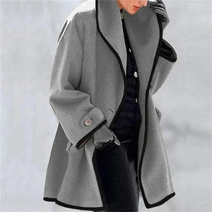 Abrigo de invierno en gris con ribete negro