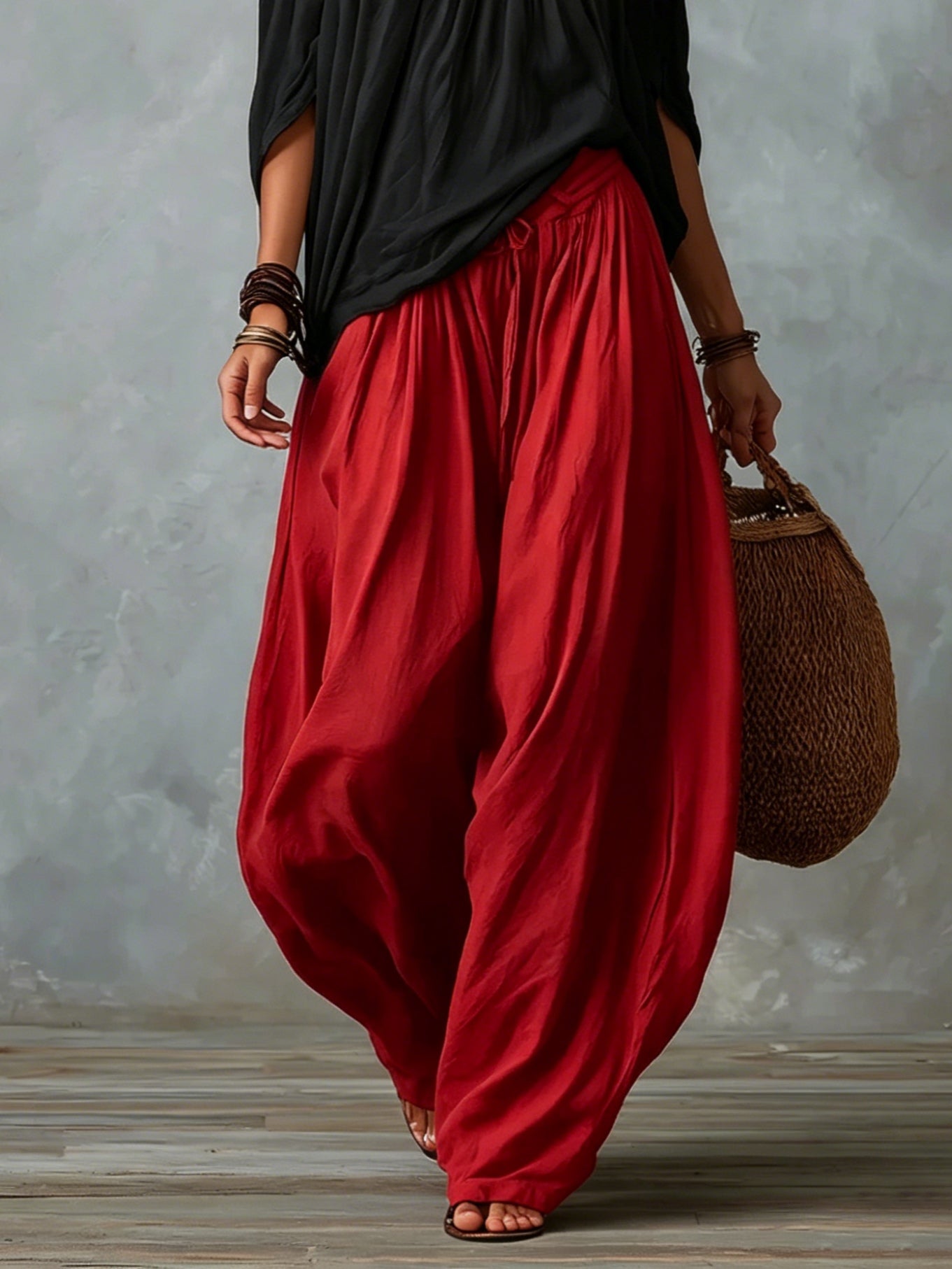 Top Negro Off-Shoulder y Pantalones Lantern Rojos de Corte Suelto