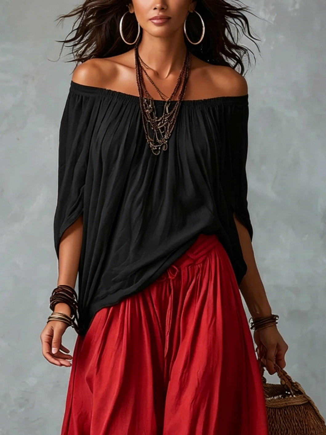 Top Negro Off-Shoulder y Pantalones Lantern Rojos de Corte Suelto