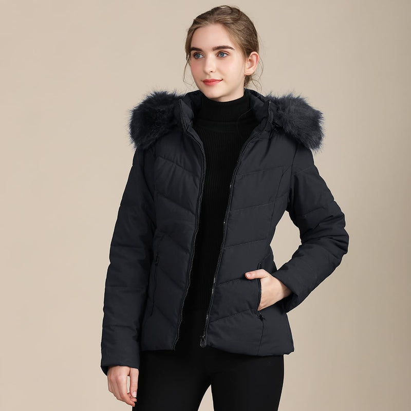 Chaqueta acolchada Nerise en negro, con capucha de borde afelpado y cremallera